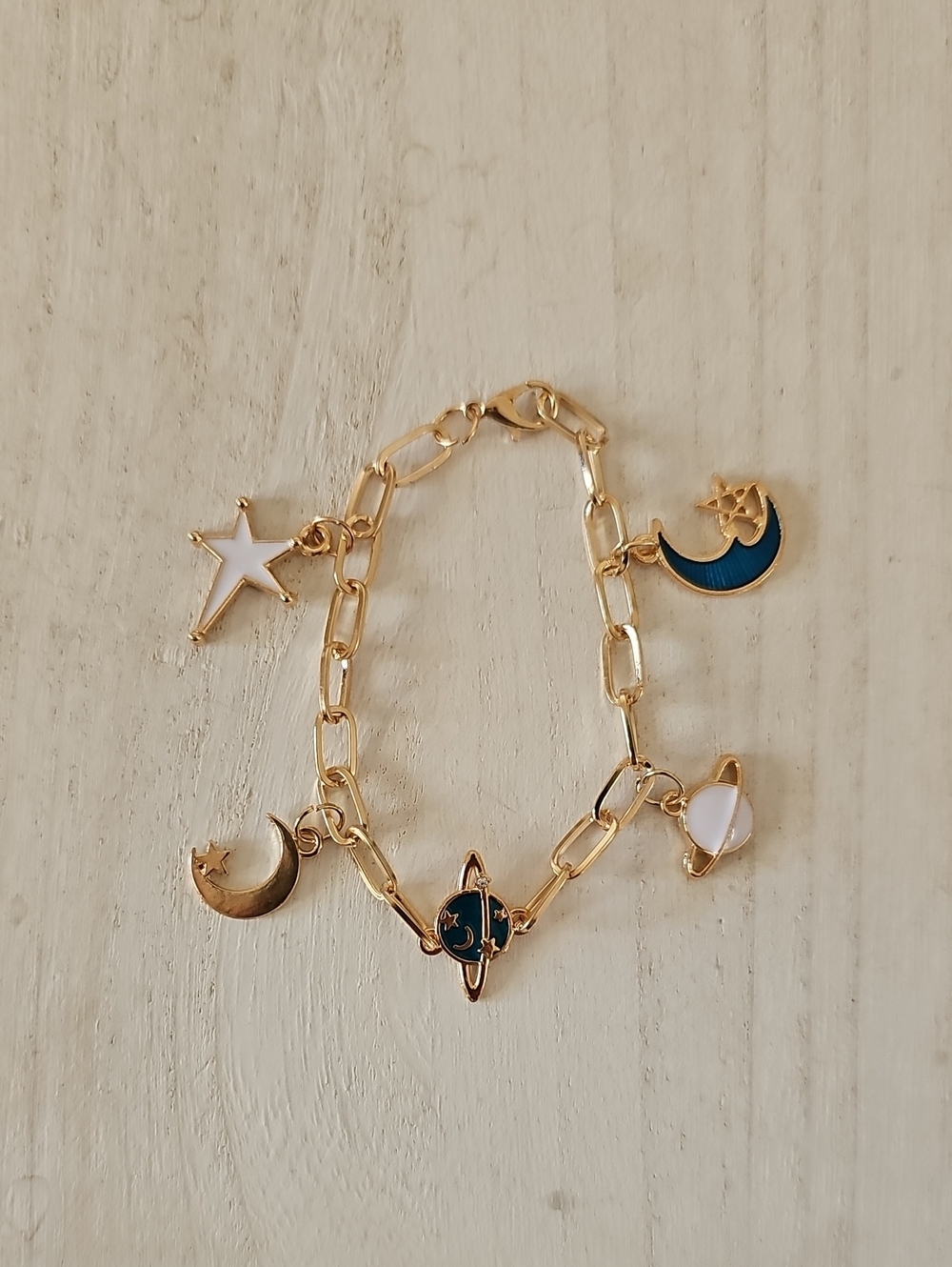 Gold Charm Bracelet with White and Teal Celestial Accents